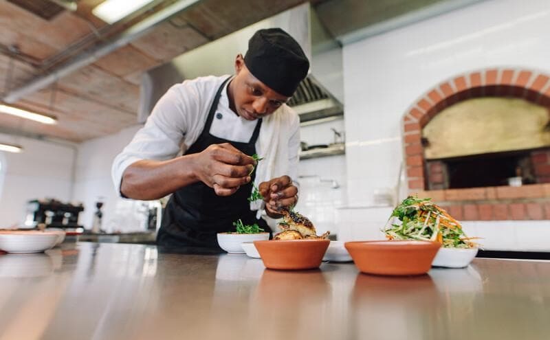 webimage-Chef-cooking-food-at-commercial-kitchen